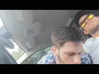 sucking cock of handsome driver in car